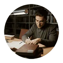 young man studying in a library